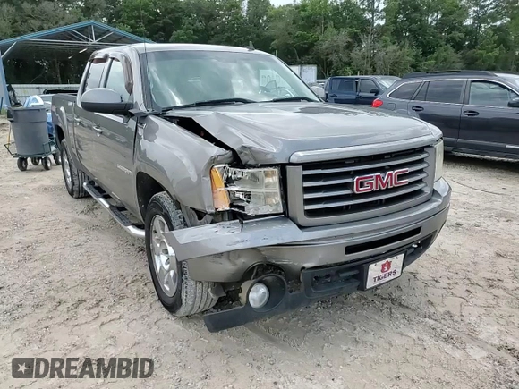 2013 GMC Sierra 1500 SLT with VIN 3GTP2WE25DG134770, listed as a Copart auction lot 59616535 with 212,304 mi miles and Salvage title. Bid and sale history available at DreamBid. Image 13.