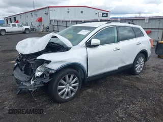 2010 Mazda CX-9 Touring with VIN JM3TB3MV1A0230587, listed as a IAAI auction lot 42152793 with 122,426 mi miles and . Bid and sale history available at carsss.com. Image 2.