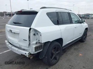 2016 Jeep Compass Latitude with VIN 1C4NJCEA3GD735161, listed as a IAAI auction lot 40881008 with 126,384 mi miles. Bid and sale history available at carsss.com. Image 4.