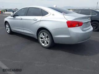 2014 Chevrolet Impala LT with VIN 1G1115SL0EU161902, listed as a IAAI auction lot 41959143 with 125,101 mi miles. Bid and sale history available at carsss.com. Image 3.