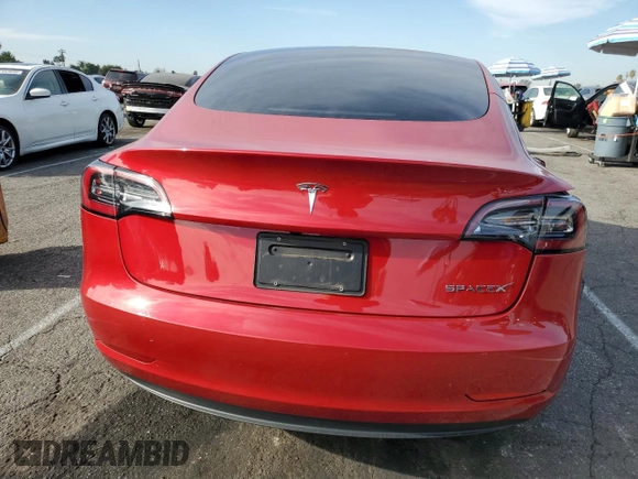 2023 Tesla Model 3 with VIN 5YJ3E1EA5PF548786, listed as a Copart auction lot 82928324 with Not Provided miles and Salvage Title. Bid and sale history available at DreamBid. Image 6.