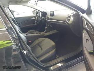 2017 Mazda Mazda3 4-Door Touring with VIN 3MZBN1V76HM104245, listed as a IAAI auction lot 41772400 with 91,166 mi miles. Bid and sale history available at carsss.com. Image 5.