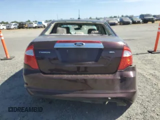 2012 Ford Fusion SEL z VIN 3FAHP0JA5CR365855, wystawiony jako Copart lot #58206175 z przebiegiem 72 223 mil mil oraz Szkoda całkowita • Salvage title. Historia ofert i sprzedaży dostępna na DreamBid. Obrazek 6.