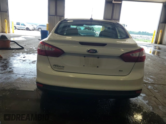 2013 Ford Focus SE with VIN 1FADP3F22DL249403, listed as a Copart auction lot 62295645 with 83,328 mi miles and Salvage title. Bid and sale history available at DreamBid. Image 6.