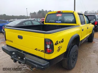 2004 Dodge Dakota Sport with VIN 1D7HG38N64S752270, listed as a IAAI auction lot 41555599 with 121,283 mi miles. Bid and sale history available at carsss.com. Image 4.