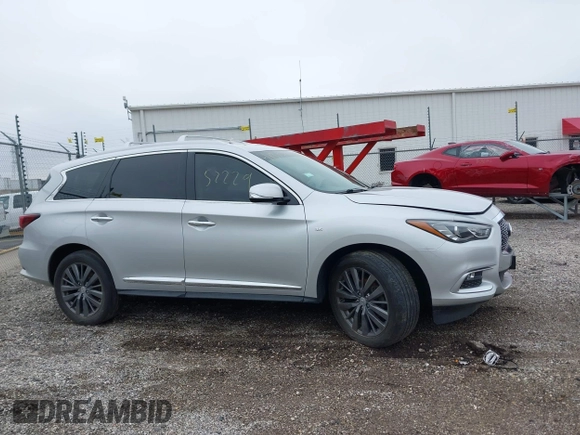 2016 Infiniti QX60 with VIN 5N1AL0MM8GC518533, listed as a IAAI auction lot 41947606 with 100,185 mi miles and . Bid and sale history available at DreamBid. Image 14.