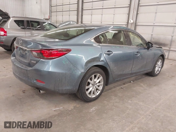 2015 Mazda 6 i Sport with VIN JM1GJ1U65F1170793, listed as a IAAI auction lot 41266146 with 125,701 mi miles and . Bid and sale history available at carsss.com. Image 4.