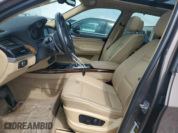 2012 BMW X5 35i with VIN 5UXZV4C51CL748765, listed as a Copart auction lot 62339905 with Not provided miles and Clean title. Bid and sale history available at DreamBid. Image 7.