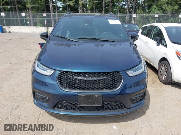 2023 Chrysler Pacifica Limited with VIN 2C4RC3GGXPR555282, listed as a IAAI auction lot 42452848 with 18,373 mi miles and . Bid and sale history available at DreamBid. Image 13.