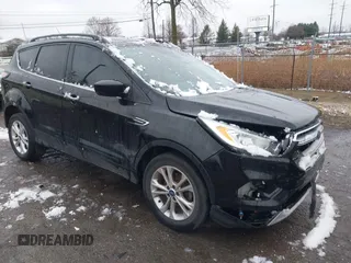 2017 Ford Escape SE with VIN 1FMCU0GD5HUD08968, listed as a IAAI auction lot 42008576 with 95,363 mi miles and . Bid and sale history available at DreamBid. Image 1.