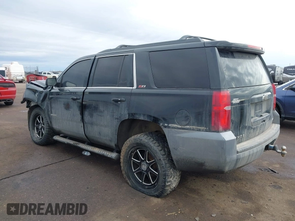 2017 Chevrolet Tahoe LT with VIN 1GNSKBKC7HR178685, listed as a IAAI auction lot 41466840 with 163,610 mi miles and . Bid and sale history available at DreamBid. Image 3.