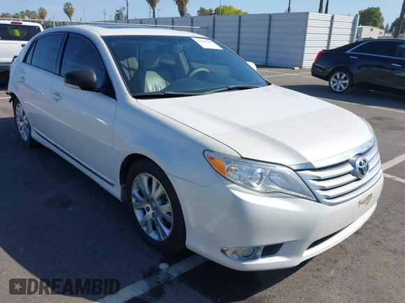 2011 Toyota Avalon with VIN 4T1BK3DB0BU414192, listed as a IAAI auction lot 42099301 with 220,967 mi miles and . Bid and sale history available at carsss.com. Image 1.