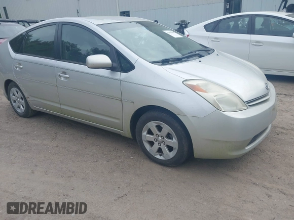 2005 Toyota Prius z VIN JTDKB20U257051452, wystawiony jako IAAI lot #42451660 z przebiegiem 166 106 mil mil oraz . Historia ofert i sprzedaży dostępna na DreamBid. Obrazek 1.