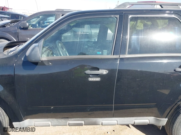 2010 Ford Escape XLT with VIN 1FMCU0DG1AKA15388, listed as a IAAI auction lot 41752399 with 189,655 mi miles. Bid and sale history available at carsss.com. Image 15.