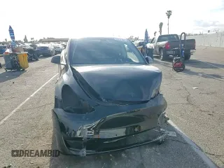 2022 Tesla Model Y Performance with VIN 7SAYGDEF9NF455508, listed as a Copart auction lot 51517205 with Not provided miles and Salvage title. Bid and sale history available at DreamBid. Image 11.