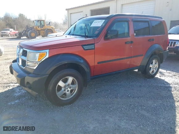 2007 Dodge Nitro SXT with VIN 1D8GT28K67W591158, listed as a IAAI auction lot 41672372 with 218,052 mi miles. Bid and sale history available at carsss.com. Image 2.
