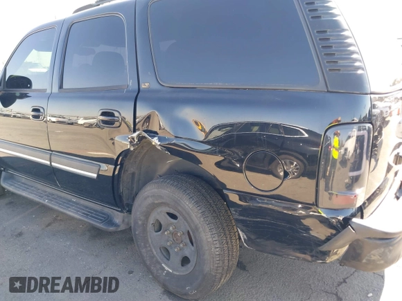 2004 Chevrolet Tahoe LS with VIN 1GNEC13T94J331286, listed as a IAAI auction lot 40691697 with 211,544 mi miles. Bid and sale history available at carsss.com. Image 6.