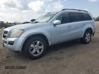 2007 Mercedes-Benz GL-Class with VIN 4JGBF71E77A141285, listed as a Copart auction lot 69225694 with 128,827 mi miles and Salvage Title. Bid and sale history available at carsss.com. Image 1.