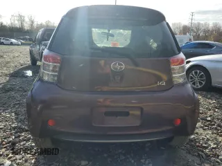 2013 Scion iQ with VIN JTNJJXB00DJ022017, listed as a Copart auction lot 82717994 with Not provided miles and Salvage title. Bid and sale history available at DreamBid. Image 6.