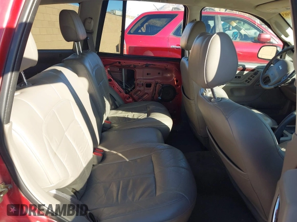 2002 Jeep Grand Cherokee Limited with VIN 1J8GX58N92C186560, listed as a IAAI auction lot 41383003 with 206,195 mi miles and . Bid and sale history available at DreamBid. Image 8.
