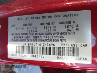 2016 Mazda Mazda3 i Sport with VIN JM1BM1U71G1345696, listed as a IAAI auction lot 41845701 with 141,646 mi miles. Bid and sale history available at carsss.com. Image 9.
