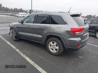 2011 Jeep Grand Cherokee 70th Anniversary with VIN 1J4RR4GG0BC608829, listed as a IAAI auction lot 41960876 with 231,714 mi miles. Bid and sale history available at carsss.com. Image 3.