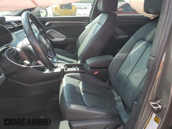 2021 Audi Q3 Premium with VIN WA1AUCF37M1067054, listed as a Copart auction lot 57299815 with 67,334 mi miles and Salvage title. Bid and sale history available at DreamBid. Image 7.