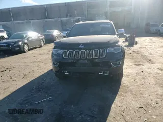 2017 Jeep Grand Cherokee Overland with VIN 1C4RJFCT7HC684746, listed as a Copart auction lot 83259314 with 106,848 mi miles and Salvage Title. Bid and sale history available at carsss.com. Image 12.