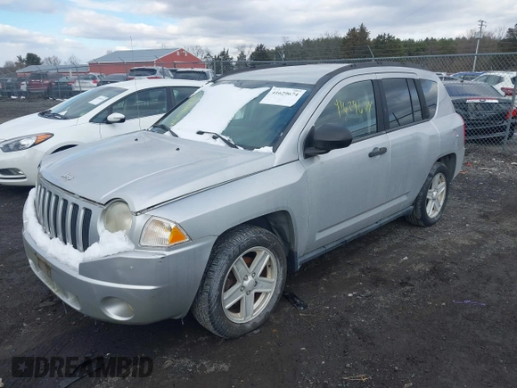 2007 Jeep Compass Sport with VIN 1J8FF47W17D142461, listed as a IAAI auction lot 41629674 with 153,516 mi miles. Bid and sale history available at carsss.com. Image 2.