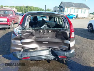 2013 Honda CR-V LX with VIN 3CZRM3H31DG703436, listed as a IAAI auction lot 42702584 with 140,013 mi miles and . Bid and sale history available at DreamBid. Image 6.