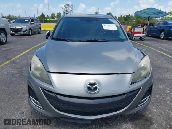 2011 Mazda 3 S Grand Touring z VIN JM1BL1W55B1474676, wystawiony jako IAAI lot #42494974 z przebiegiem 162 285 mil mil oraz . Historia ofert i sprzedaży dostępna na DreamBid. Obrazek 6.