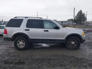 2003 Ford Explorer XLT z VIN 1FMZU73W13ZA42256, wystawiony jako IAAI lot #41234031 z przebiegiem Nie podano mil oraz . Historia ofert i sprzedaży dostępna na DreamBid. Obrazek 13.
