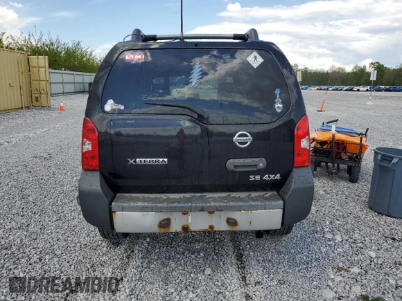 2010 Nissan Xterra S with VIN 5N1AN0NW8AC506660, listed as a Copart auction lot 55810805 with 203,227 mi miles and Salvage title. Bid and sale history available at DreamBid. Image 6.