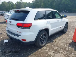2021 Jeep Grand Cherokee Trailhawk with VIN 1C4RJFLG5MC564912, listed as a IAAI auction lot 42589787 with 25,604 mi miles and . Bid and sale history available at DreamBid. Image 4.