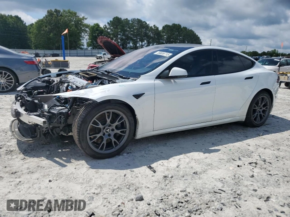 2021 Tesla Model S Long Range with VIN 5YJSA1E52MF443953, listed as a Copart auction lot 59838715 with 54,643 mi miles and Salvage title. Bid and sale history available at DreamBid. Image 1.