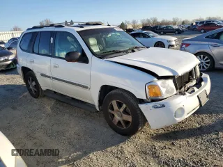 2005 GMC Envoy SLE с VIN 1GKDS13S852261326, выставлен на аукционе Copart как лот 42650025 с пробегом 210 485 миль миль и Списание • Salvage title. История ставок и продаж доступна на DreamBid. Изображение 4.