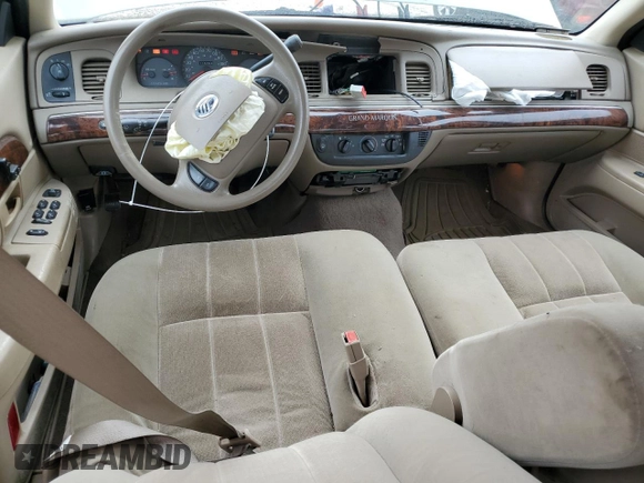 2004 Mercury Grand Marquis GS with VIN 2MEFM74W44X659873, listed as a Copart auction lot 51793205 with 115,384 mi miles and Salvage Title. Bid and sale history available at DreamBid. Image 8.