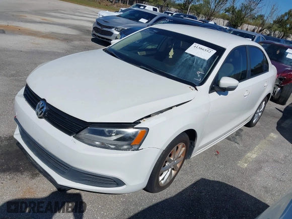2012 Volkswagen Jetta Sedan SE w/Convenience with VIN 3VWDX7AJ2CM367784, listed as a IAAI auction lot 41386552 with 104,744 mi miles. Bid and sale history available at carsss.com. Image 2.