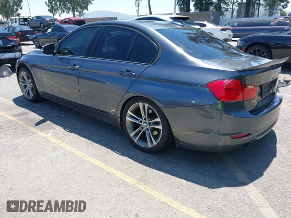 2014 BMW 3 Series 328d with VIN WBA3D3C51EK155031, listed as a IAAI auction lot 42149784 with 204,521 mi miles and . Bid and sale history available at carsss.com. Image 3.