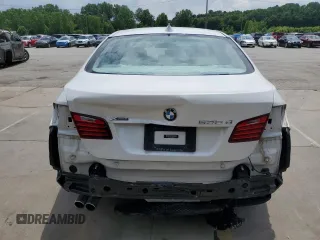 2014 BMW 5 Series 535d xDrive with VIN WBAFV3C57ED685132, listed as a Copart auction lot 60413005 with 94,355 mi miles and Salvage title. Bid and sale history available at DreamBid. Image 6.
