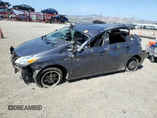 2015 Toyota Prius Four z VIN JTDKN3DU6F1914667, wystawiony jako Copart lot #56352034 z przebiegiem Nie podano mil oraz Nie do naprawy • Non repairable. Historia ofert i sprzedaży dostępna na DreamBid. Obrazek 1.