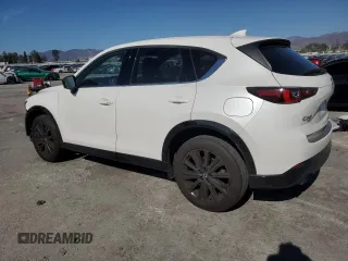 2022 Mazda CX-5 2.5 Turbo with VIN JM3KFBAY5N0525299, listed as a Copart auction lot 44736945 with 53,890 mi miles and Salvage Title. Bid and sale history available at carsss.com. Image 2.