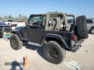 2004 Jeep Wrangler Sahara with VIN 1J4FA59S04P772756, listed as a Copart auction lot 47973495 with 92,685 mi miles and Salvage Title. Bid and sale history available at DreamBid. Image 2.