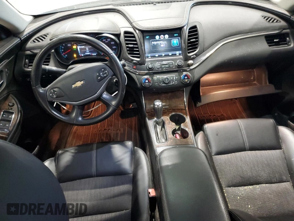 2014 Chevrolet Impala LT z VIN 2G1115SL8E9118955, wystawiony jako Copart lot #56299715 z przebiegiem 217 840 mil mil oraz Szkoda całkowita • Salvage title. Historia ofert i sprzedaży dostępna na DreamBid. Obrazek 8.