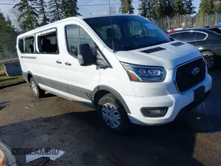 2023 Ford Transit Passenger XL with VIN 1FBAX2Y84PKB08369, listed as a IAAI auction lot 41501636 with 16,967 mi miles and . Bid and sale history available at DreamBid. Image 1.