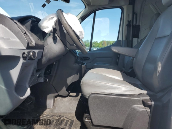 2016 Ford Transit Cargo with VIN 1FTBW3XG5GKB09483, listed as a Copart auction lot 56157045 with 216,399 mi miles and Salvage title. Bid and sale history available at DreamBid. Image 7.