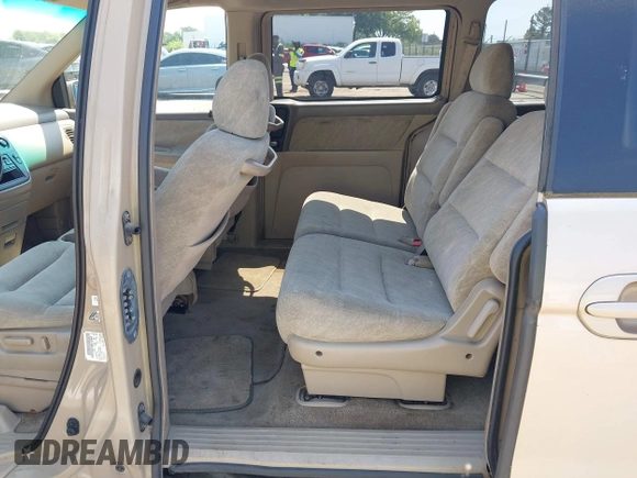 2000 Honda Odyssey EX with VIN 2HKRL1868YH001859, listed as a IAAI auction lot 42165724 with 209,393 mi miles and . Bid and sale history available at DreamBid. Image 8.