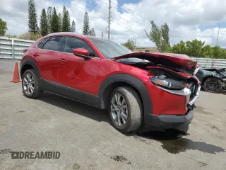 2023 Mazda CX-30 2.5 S Premium Package with VIN 3MVDMBDM0PM504875, listed as a Copart auction lot 53675505 with 8,245 mi miles and Salvage Title. Bid and sale history available at carsss.com. Image 4.