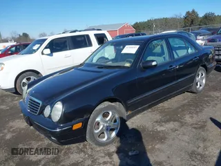 2002 Mercedes-Benz E-Class with VIN WDBJF82JX2X072422, listed as a IAAI auction lot 41390957 with 132,825 mi miles. Bid and sale history available at carsss.com. Image 2.