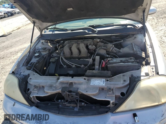 2003 Mercury Sable LS with VIN 1MEHM55S73A619013, listed as a Copart auction lot 73504154 with 200,135 mi miles and Salvage Title. Bid and sale history available at DreamBid. Image 12.